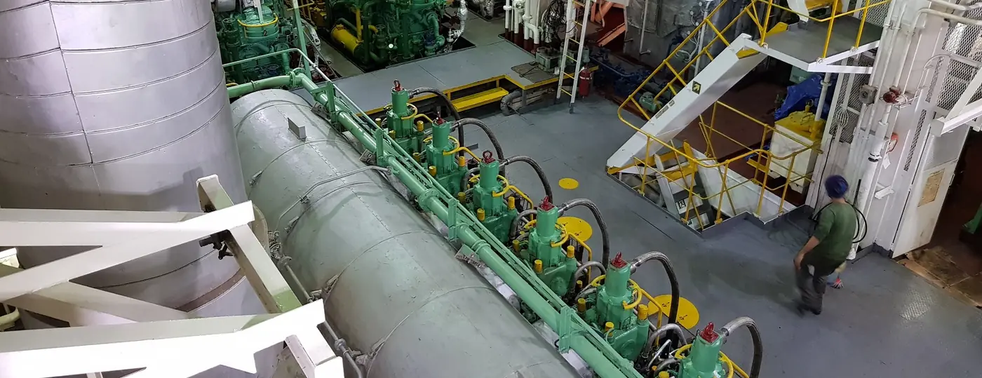 Engine room with the main engine and piping